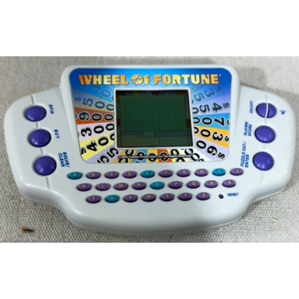 Wheel of Fortune Handheld Electronic Game 2005 Califon Productions Retro Puzzle